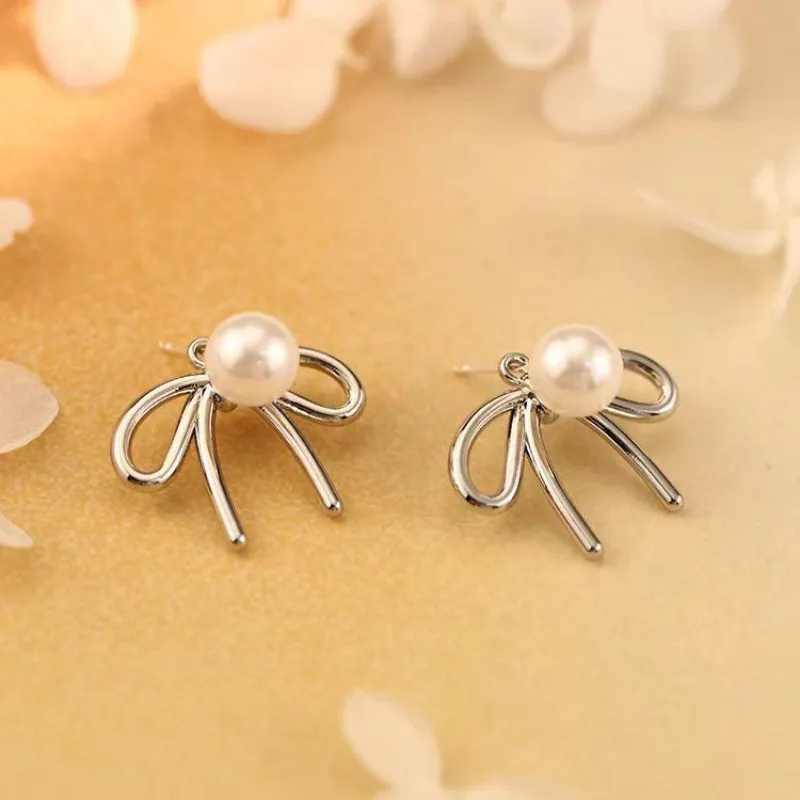 Sterling Silver Elegant Pearl Bow Earrings